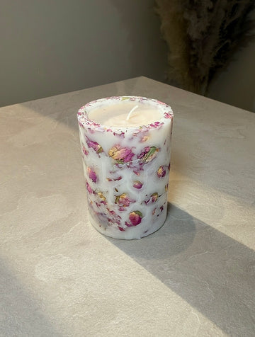 Botanisk ljus med ros blommor