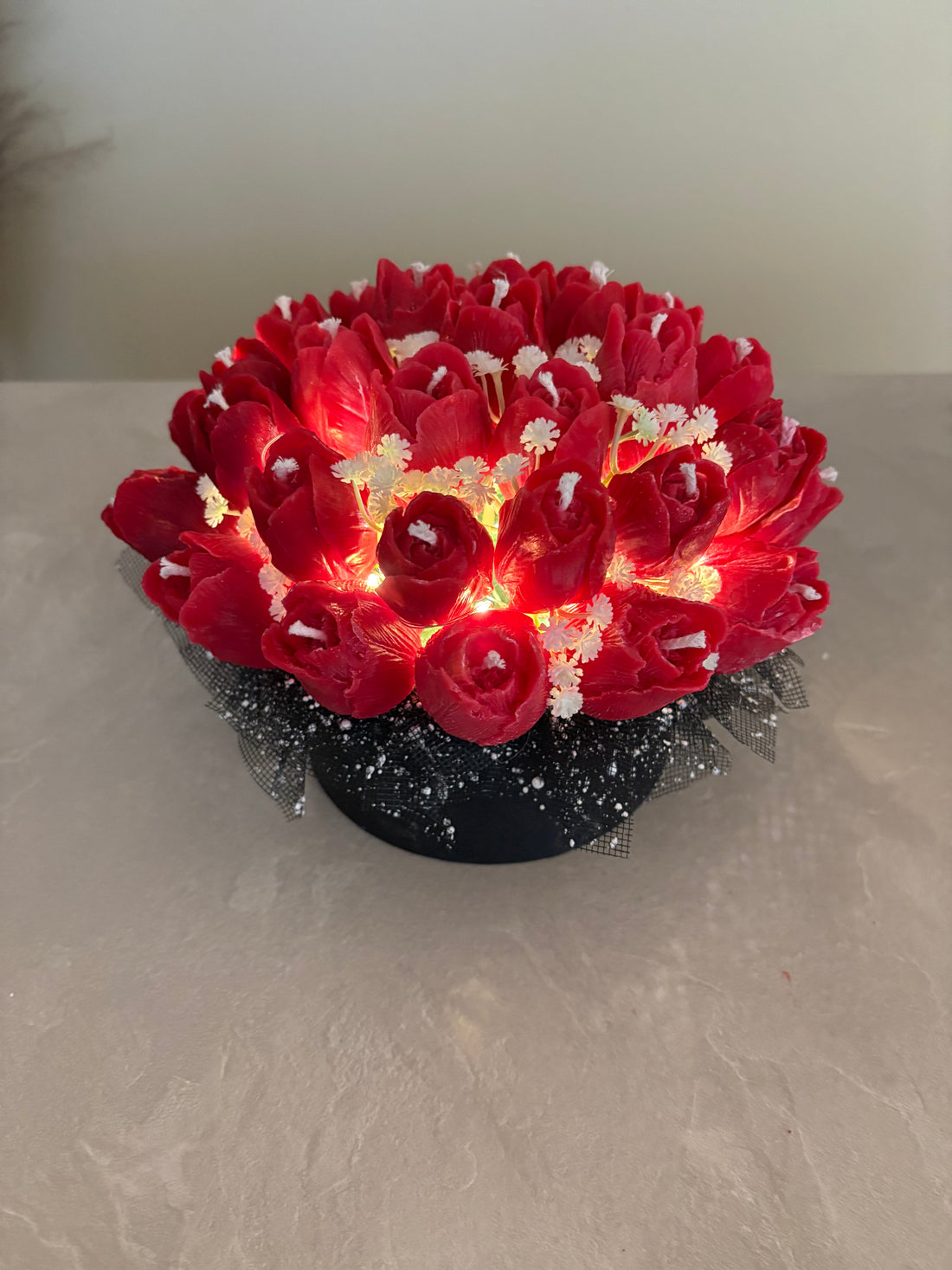 Lysande blomma i rött