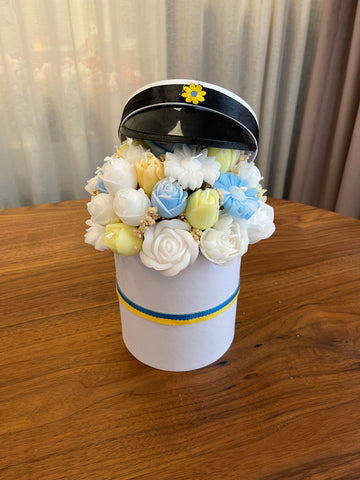 Stor student bukett med mösa